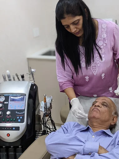 Mumbai Cosmetic Centre practitioner performing skin treatment for a patient in the Malad clinic